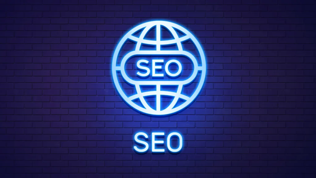 Neon SEO globe and text representing global SEO solutions offered by White Label SEO London for businesses.